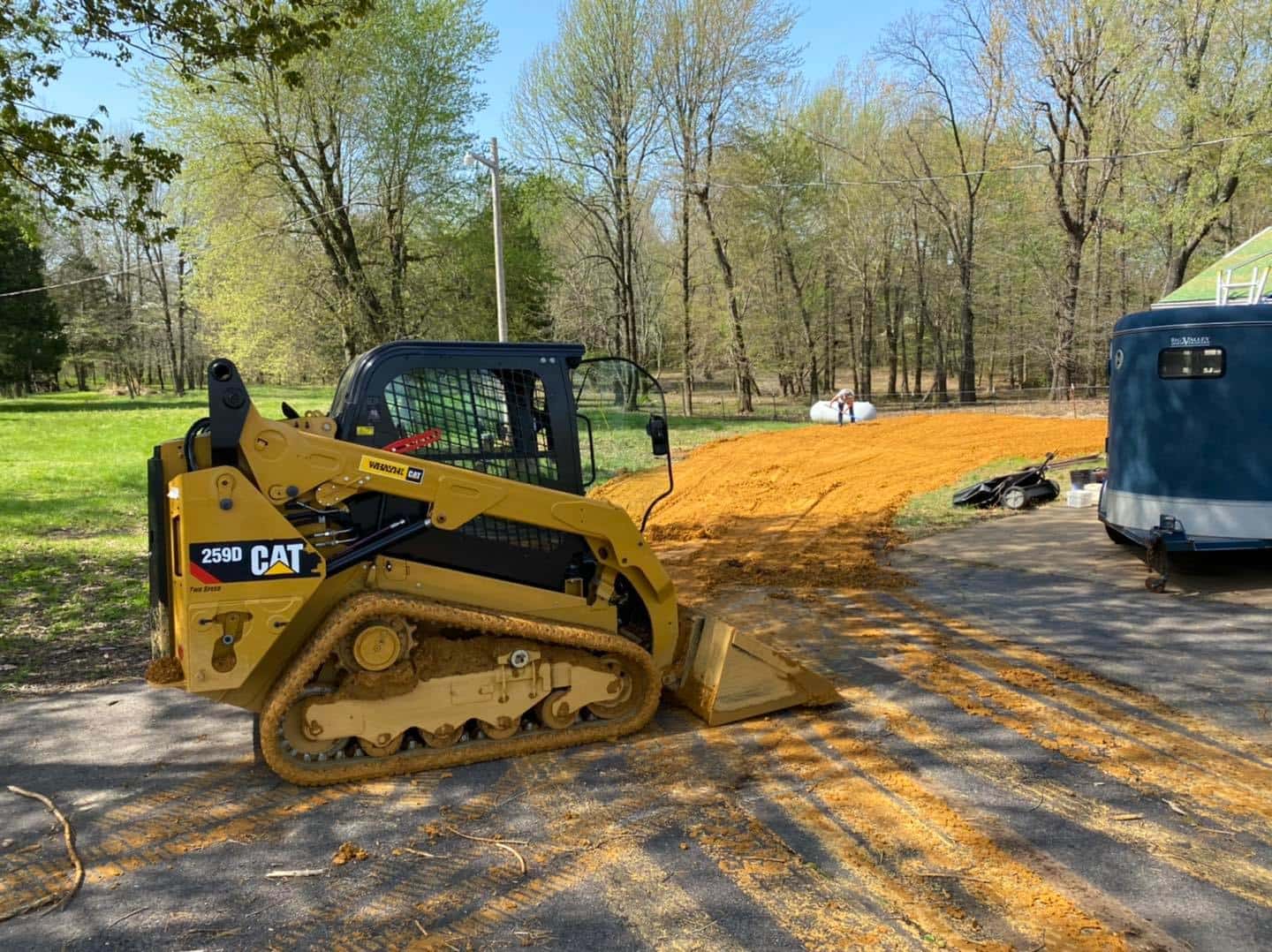 Compact track loader on a freshly graded site during excavation work near Paducah, KY